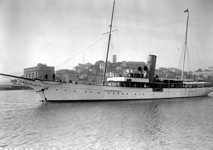 A white steam yacht at anchor in Cannes harbour, 1929